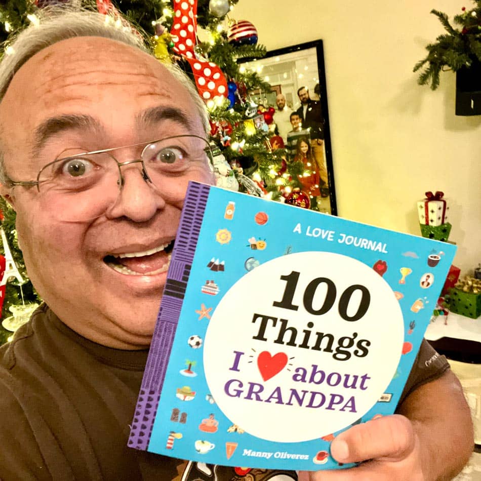 Favorite Grampy holds his new book 100 Things I Love About Grandpa.