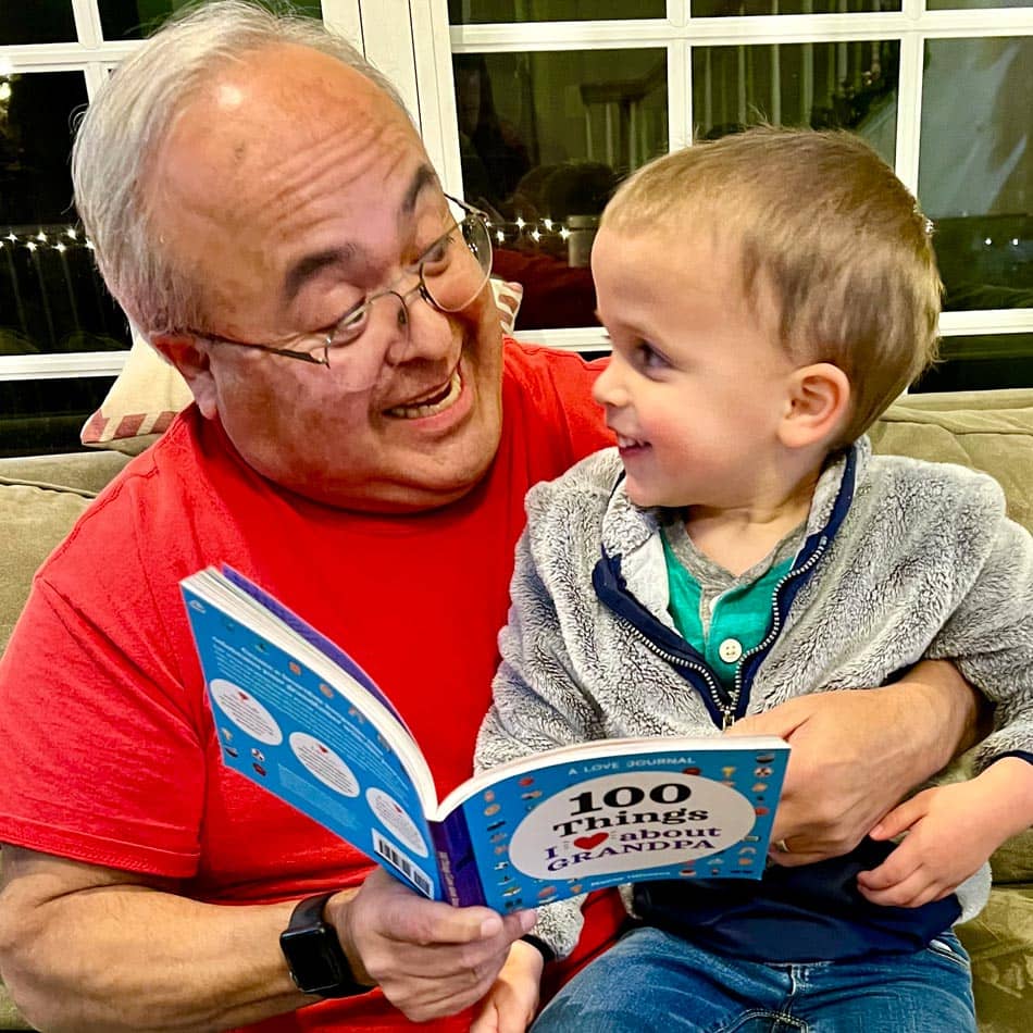 Favorite Grampy and grandchild read new book 100 Things I Love About Grandpa.